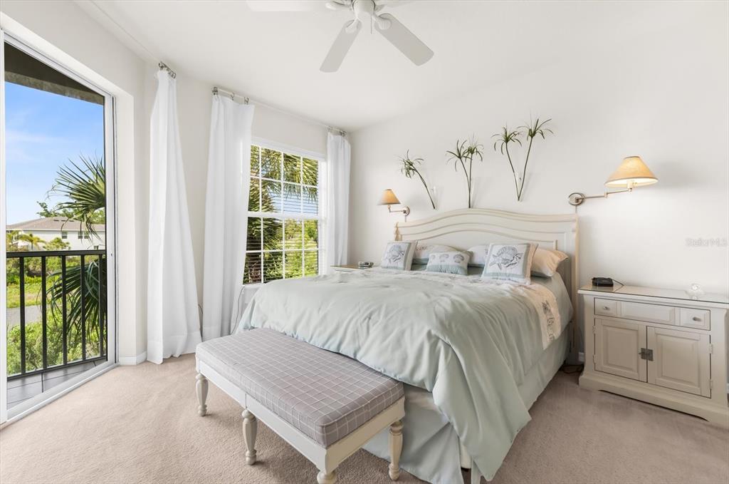 4500 Streamside Court, Unit 1408 Sarasota, FL 34238 - Photo 60 of 73 a bedroom with a bed and a window