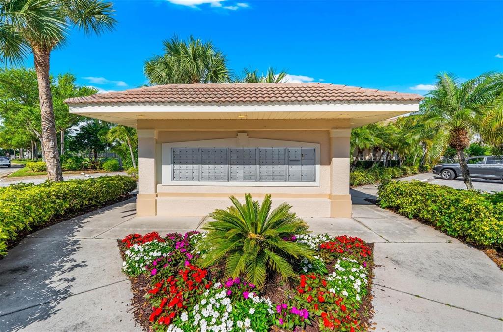 4500 Streamside Court, Unit 1408 Sarasota, FL 34238 - Photo 72 of 73 a view of a fountain in front of a house