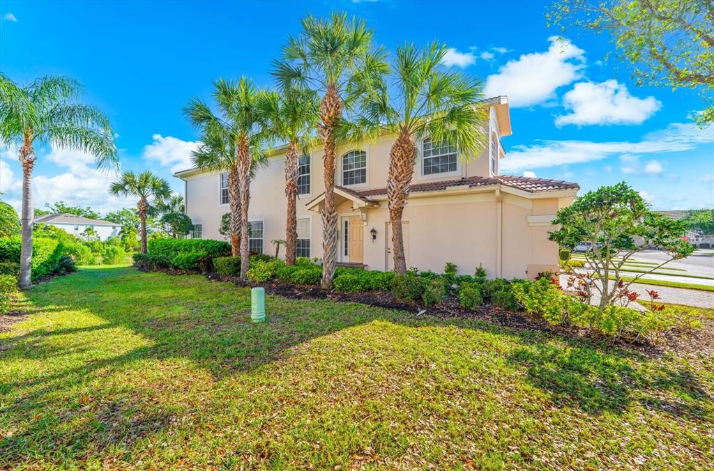 4500 Streamside Court, Unit 1408 Sarasota, FL 34238 - Photo 73 of 73 a front view of a house with garden