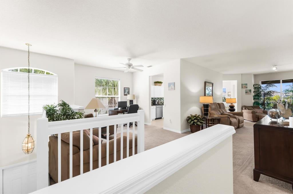 4500 Streamside Court, Unit 1408 Sarasota, FL 34238 - Photo 10 of 73 a view of a living room and bedroom with furniture