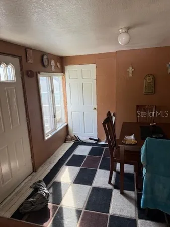 a room with a bed and a window