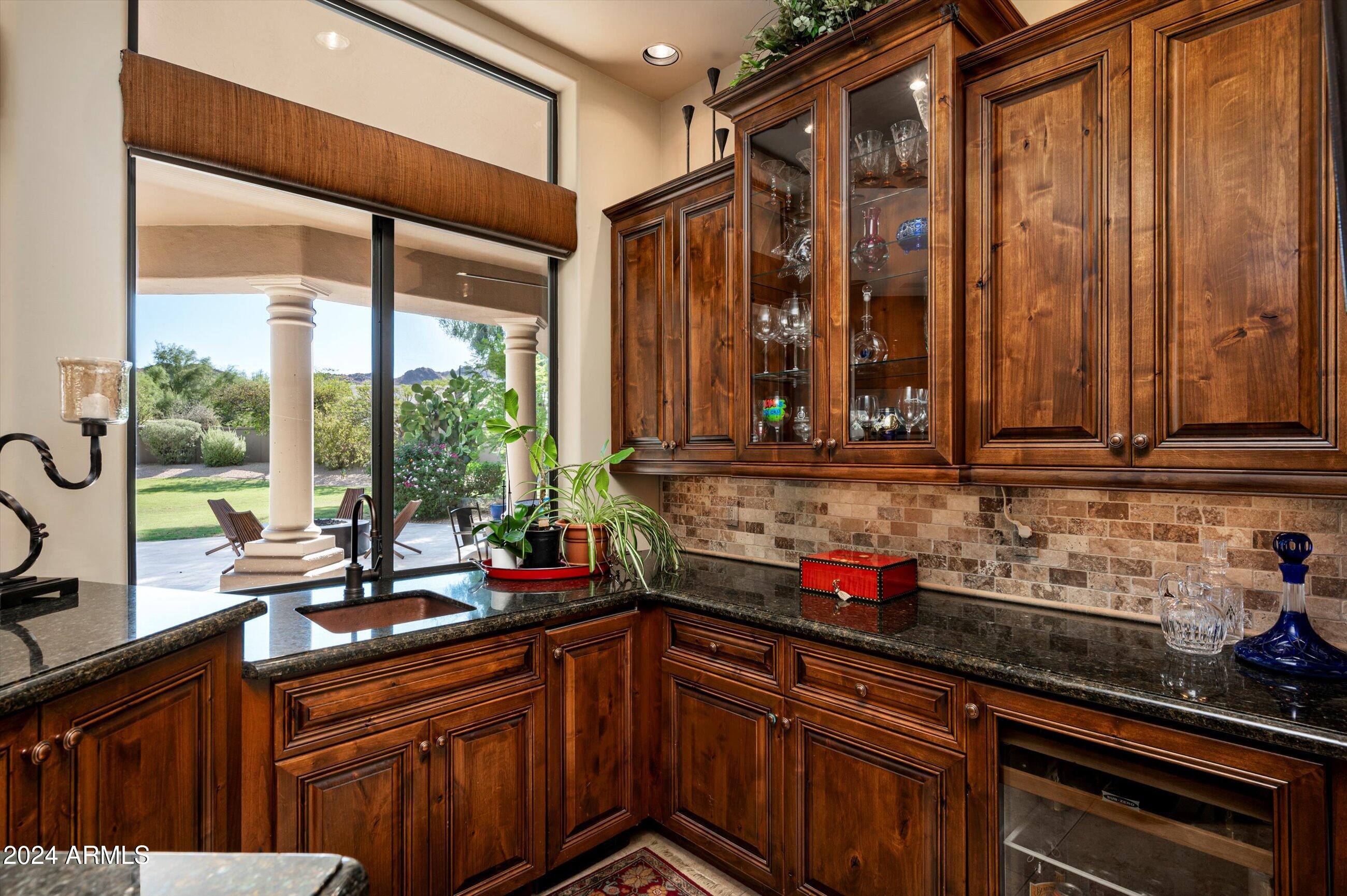 6565 East Stallion Road Paradise Valley, AZ 85253 - Photo 12 of 67 Wet Bar with access from the Patio