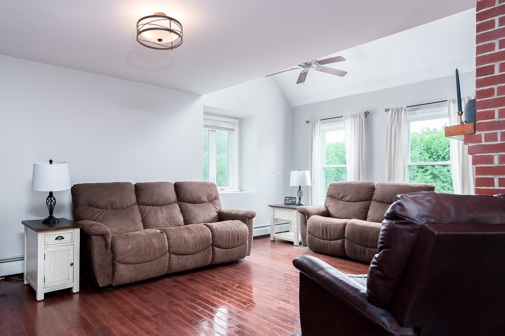 47 Glenwood Road Rutland, MA 01543 - Photo 12 of 35 a living room with furniture and a window
