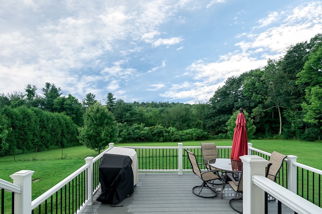 47 Glenwood Road Rutland, MA 01543 - Photo 29 of 35 a view of a deck with furniture and garden