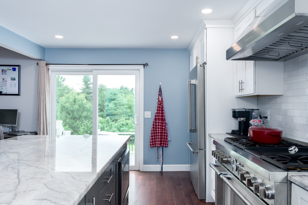 47 Glenwood Road Rutland, MA 01543 - Photo 8 of 35 a kitchen with stainless steel appliances granite countertop a stove a sink and a refrigerator