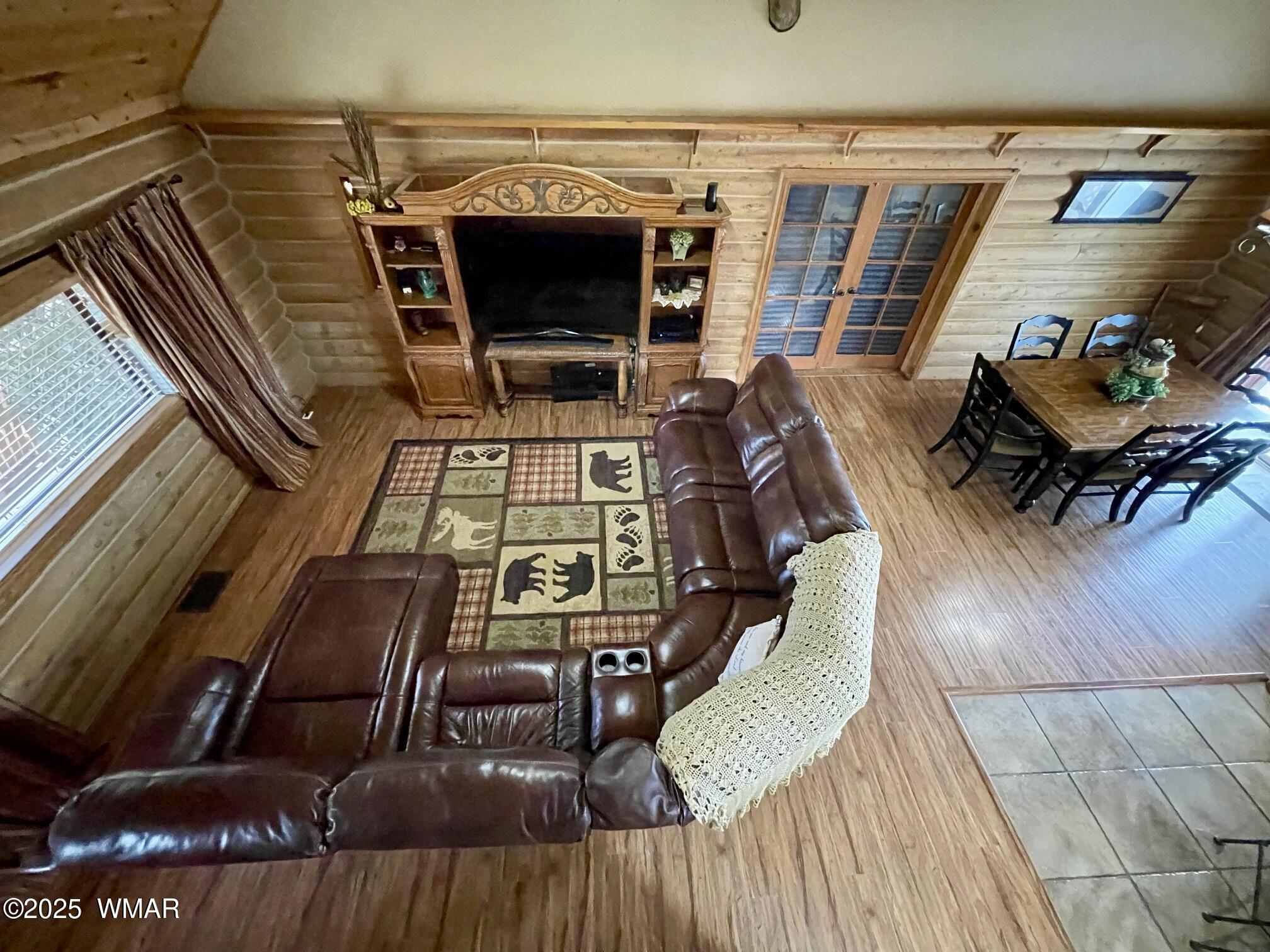 183 North Becker Lake Road Springerville, AZ 85938 - Photo 8 of 41 a living room with furniture and a fireplace
