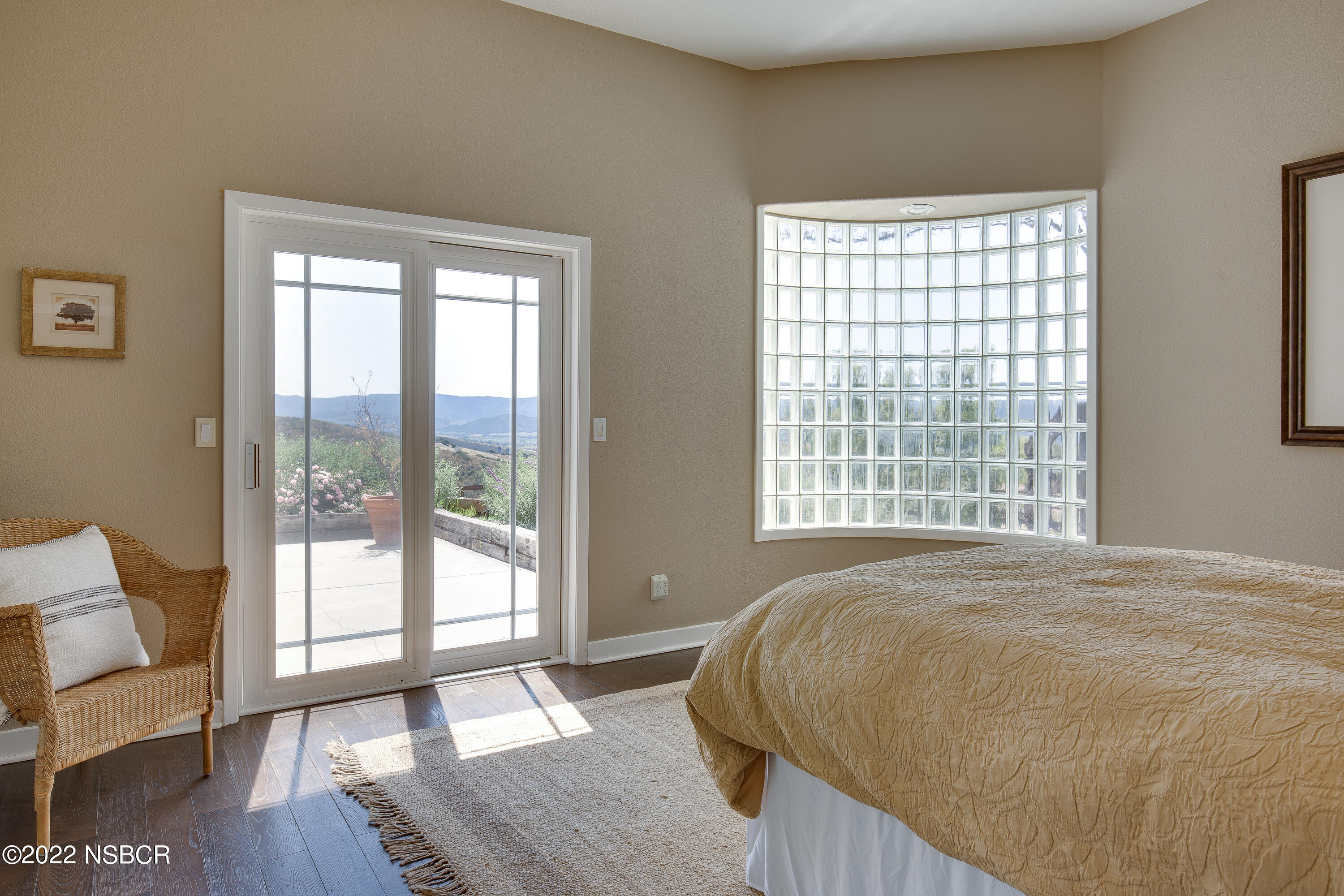 1833 Cougar Ridge Road Buellton, CA 93427 - Photo 18 of 46 a bed sitting in a bedroom next to a window