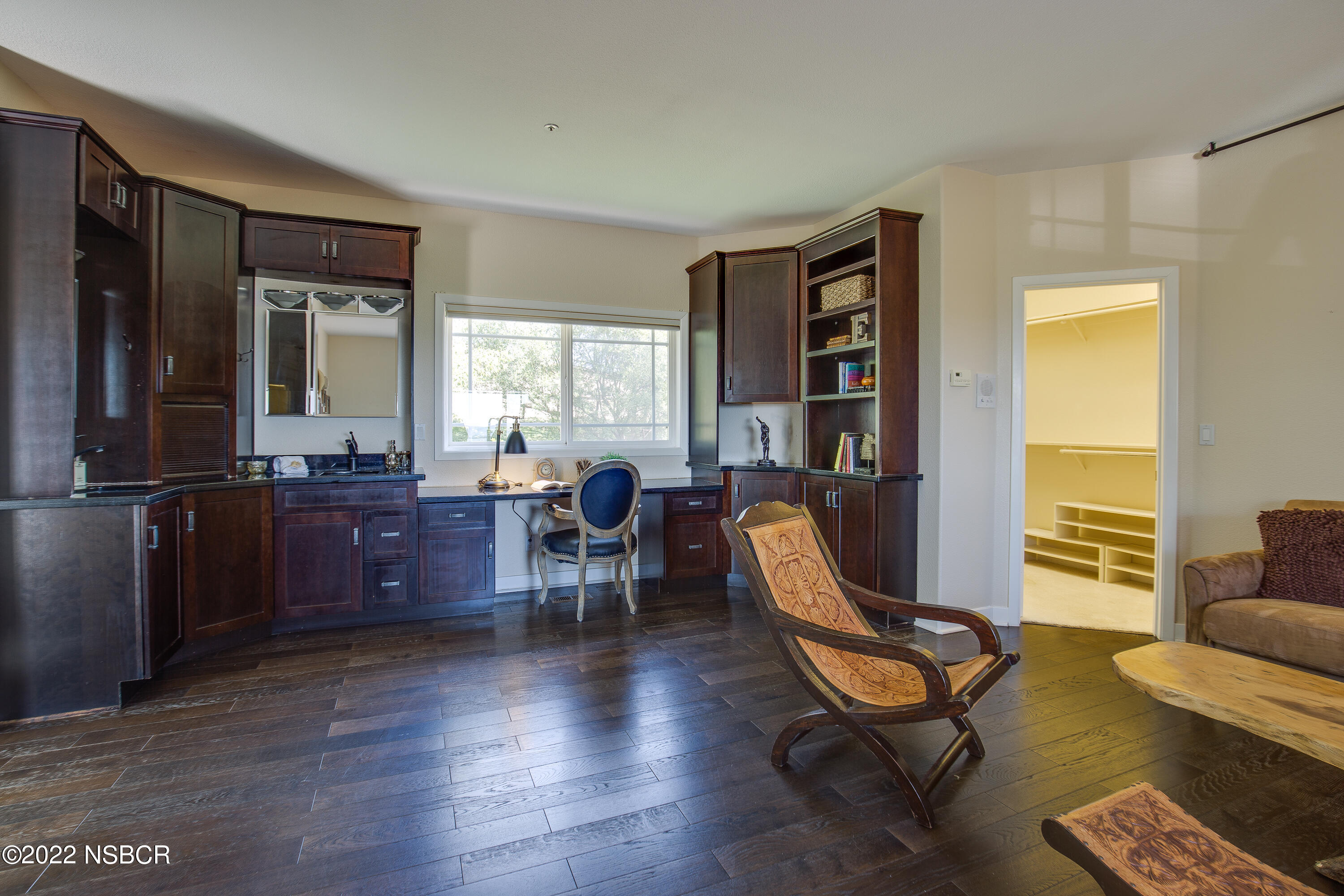1833 Cougar Ridge Road Buellton, CA 93427 - Photo 23 of 46 a living room with furniture a piano and wooden floor
