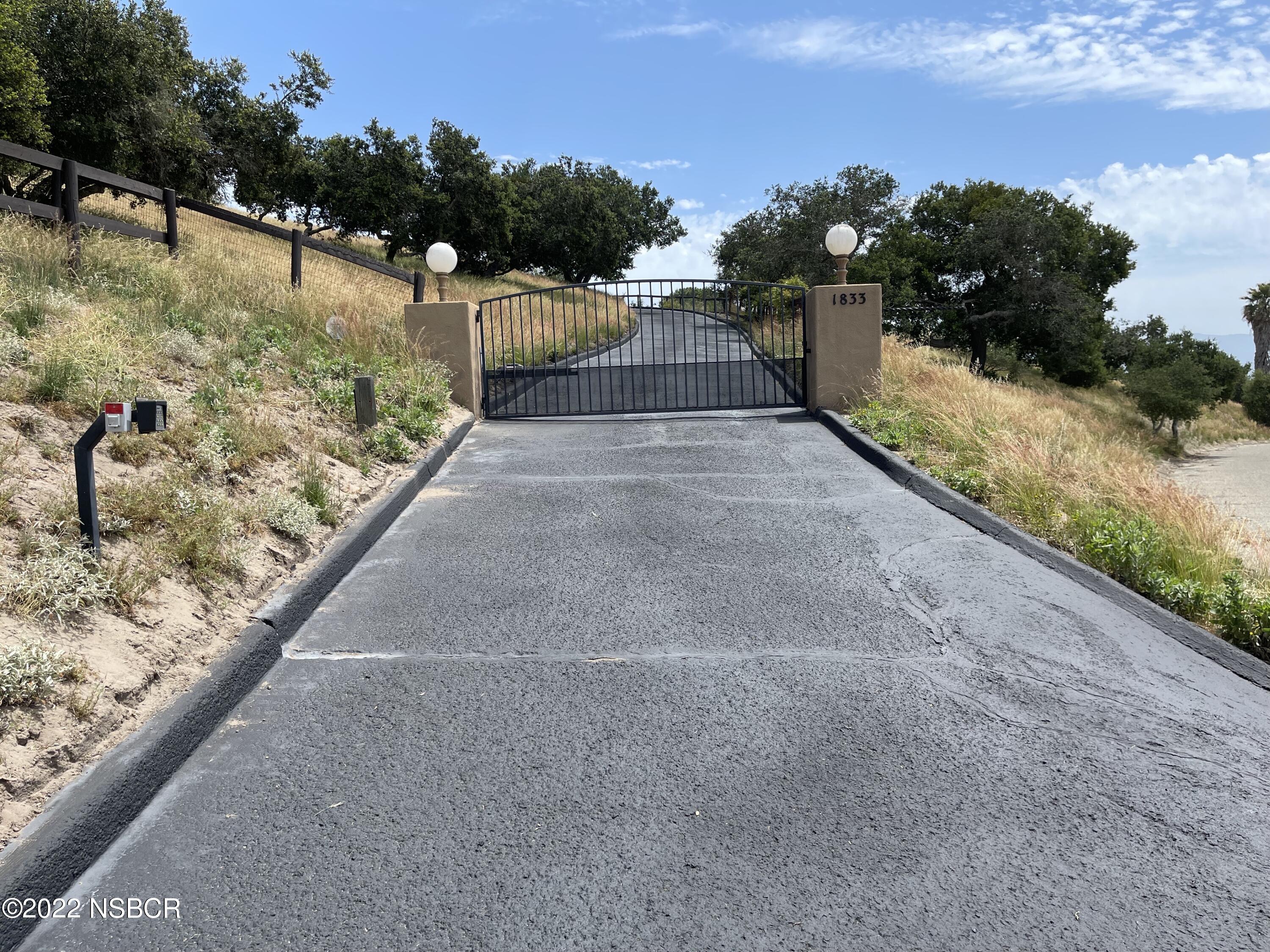 1833 Cougar Ridge Road Buellton, CA 93427 - Photo 46 of 46 a view of a pathway with a wrought fence