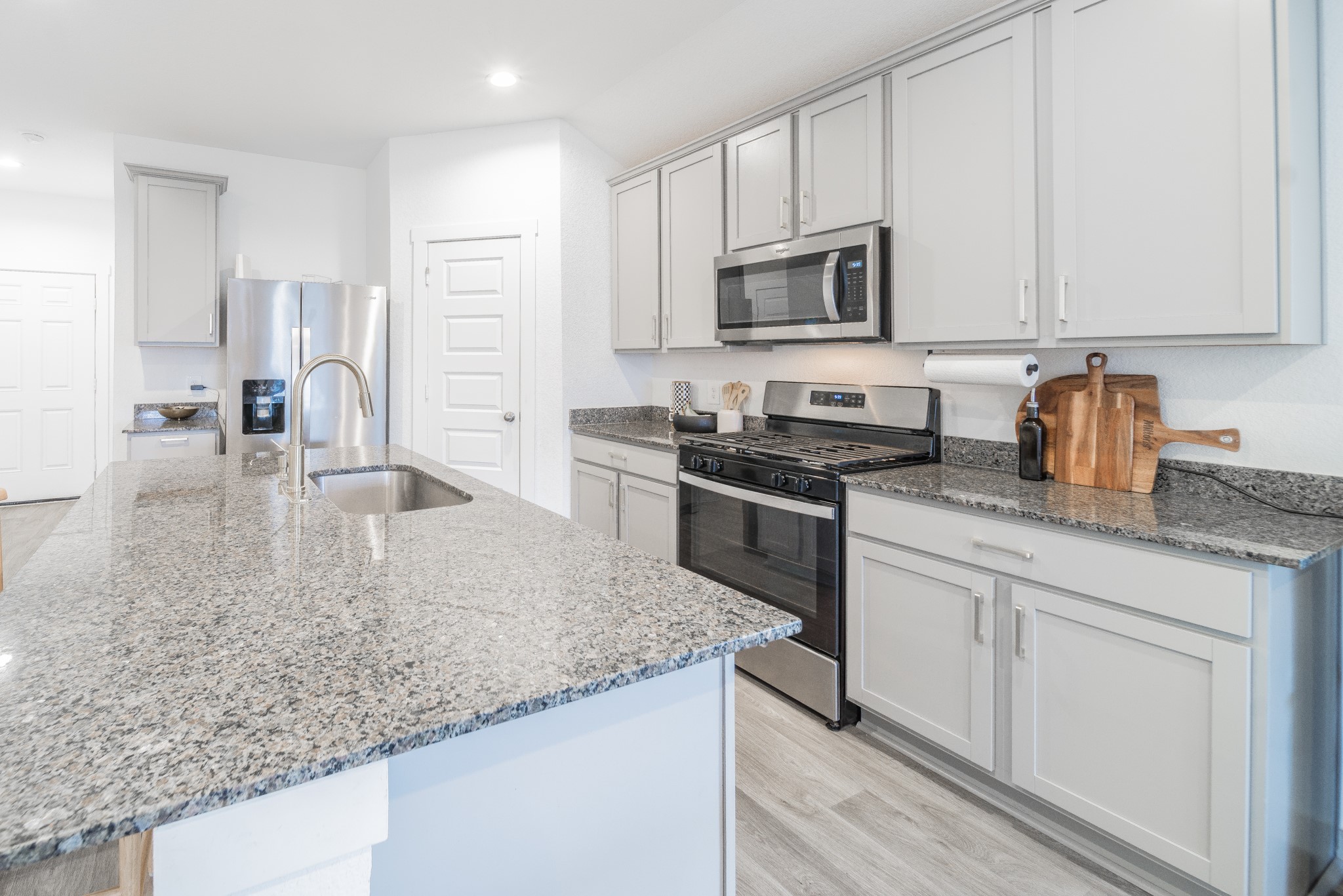 3843 Haydon Rdg Lane Fulshear, TX 77441 - Photo 34 of 36 Kitchen open floorplan to family room