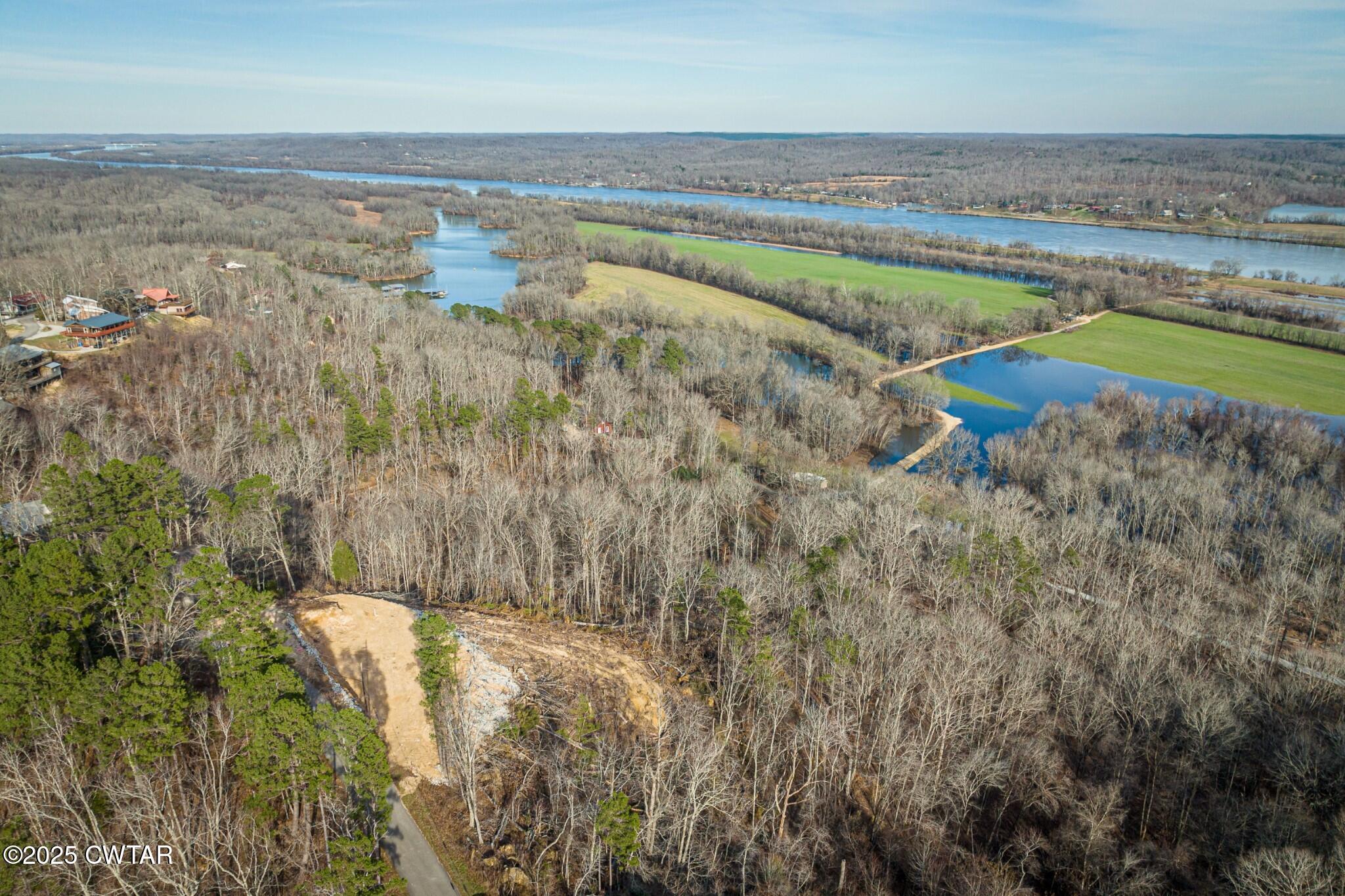 49-50 Ridgeway Drive Sugar Tree, TN 38380 - Photo 15 of 29 a view of an outdoor space and a lake view