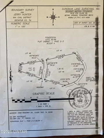 a view of a lake with a yard