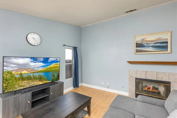 a living room with flat screen tv