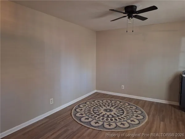 a view of wooden floor with a window