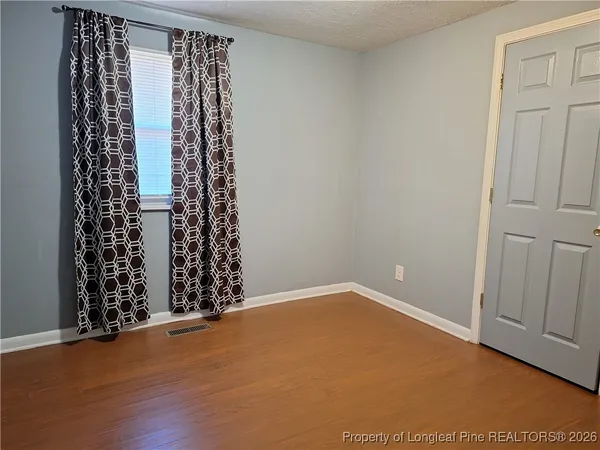 a bathroom with a sink a toilet and bathtub