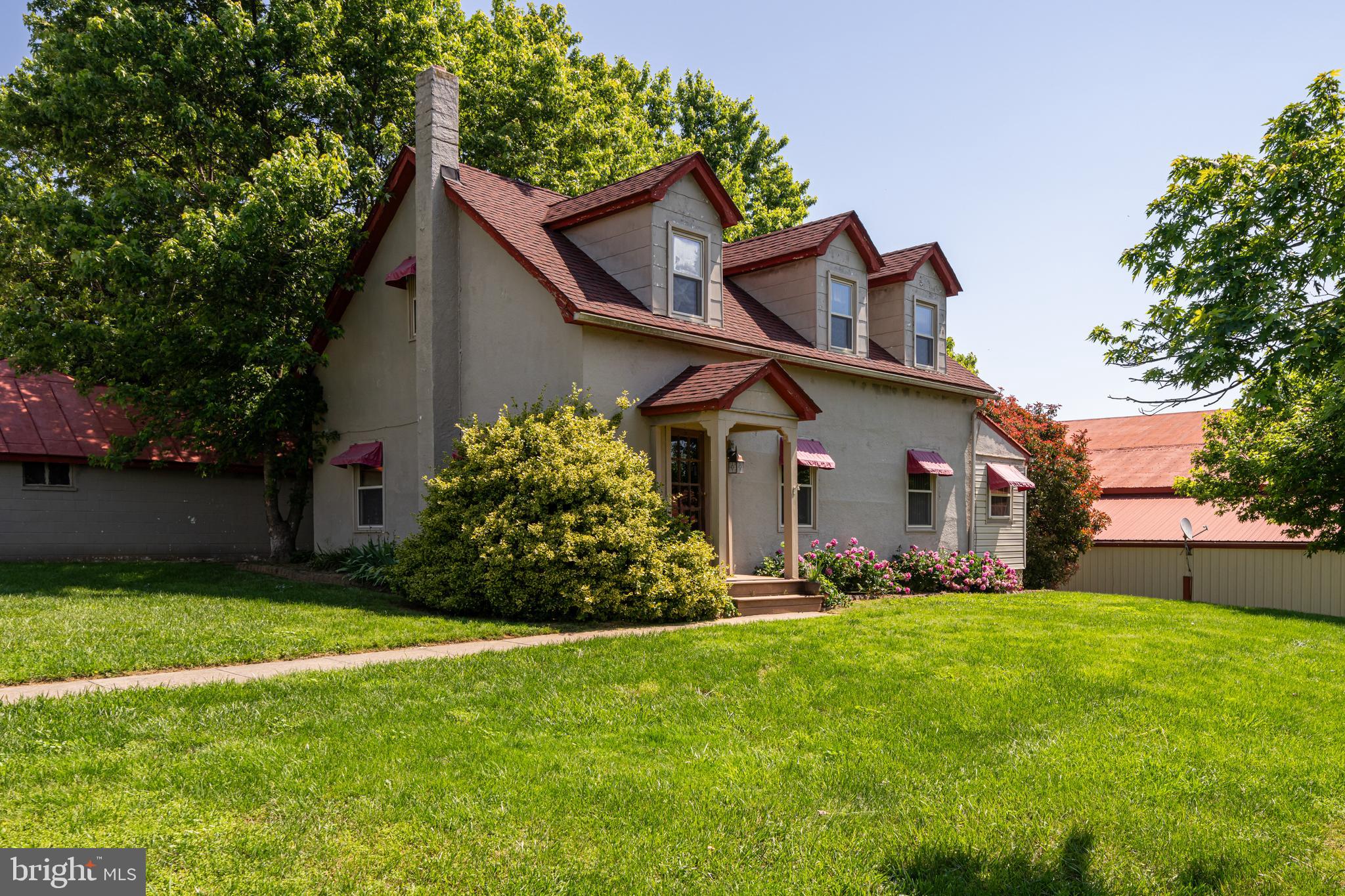 3637 Millwood Road Boyce, VA 22620 - Photo 31 of 62 a front view of house with garden