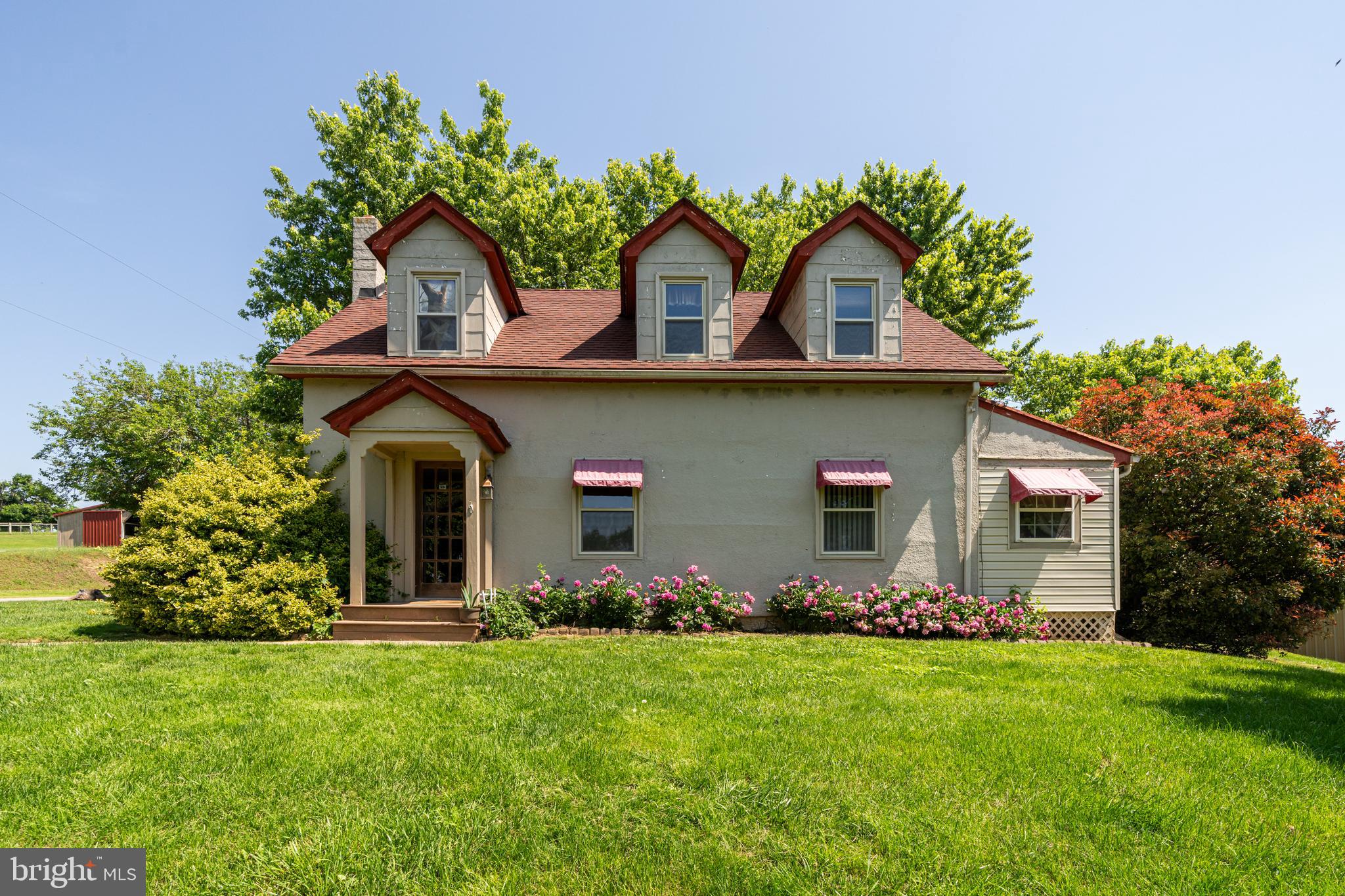 3637 Millwood Road Boyce, VA 22620 - Photo 33 of 62 a front view of house with yard and green space
