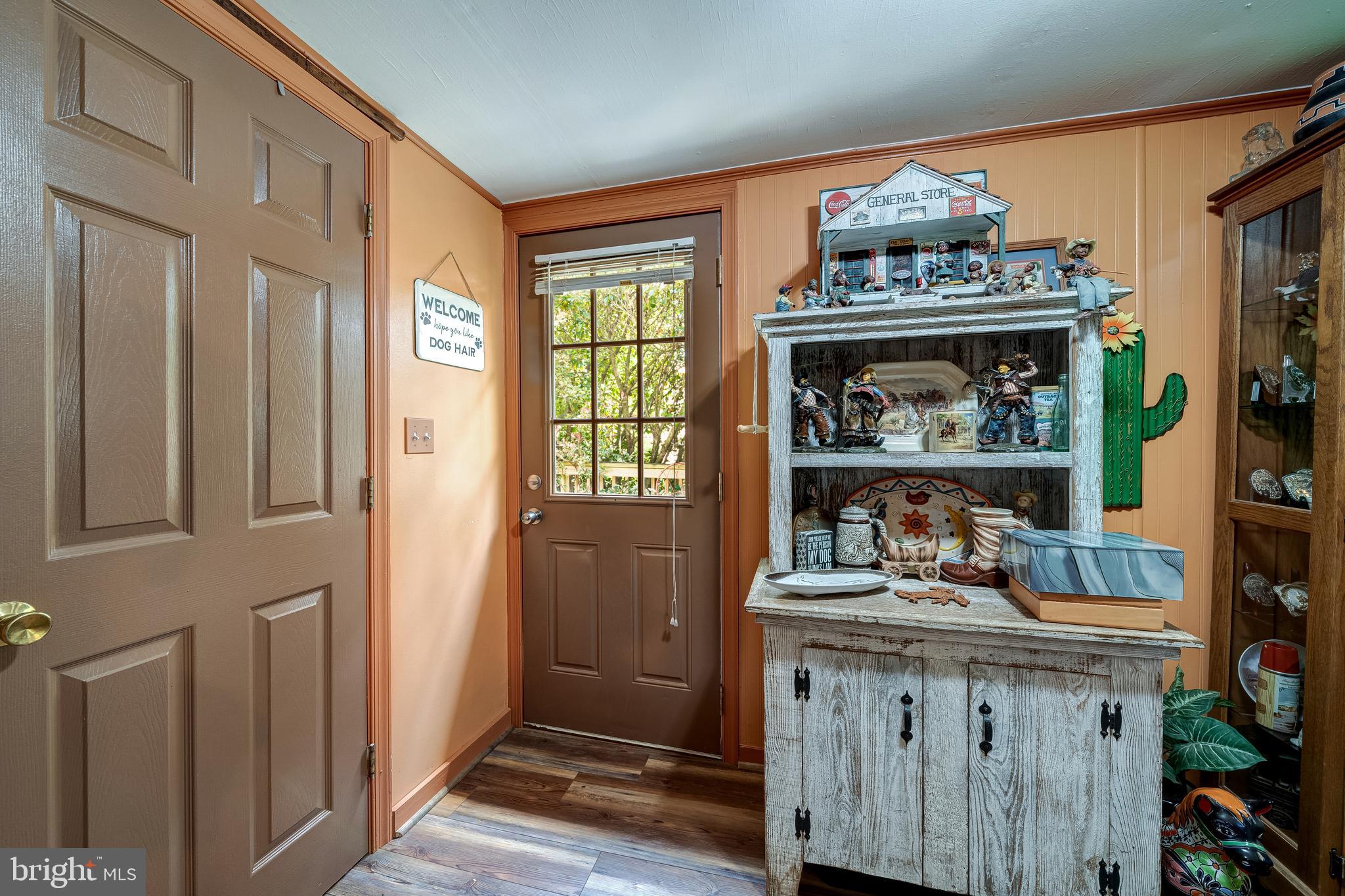 3637 Millwood Road Boyce, VA 22620 - Photo 45 of 62 a room that has a dresser and a wooden floor