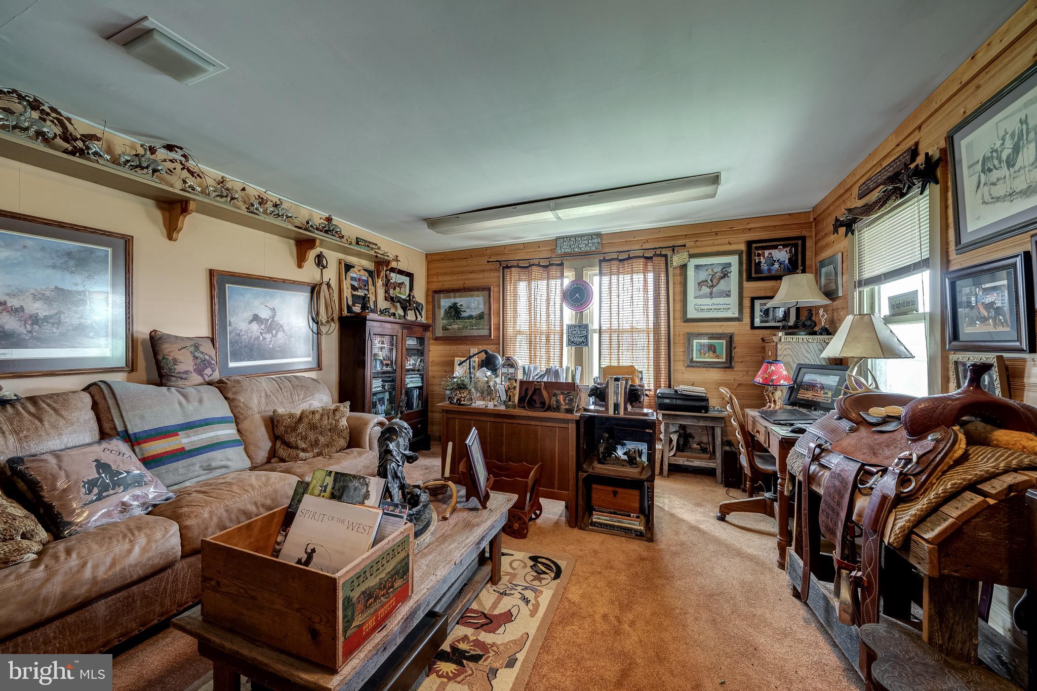 3637 Millwood Road Boyce, VA 22620 - Photo 55 of 62 a living room with lots of furniture and a large window
