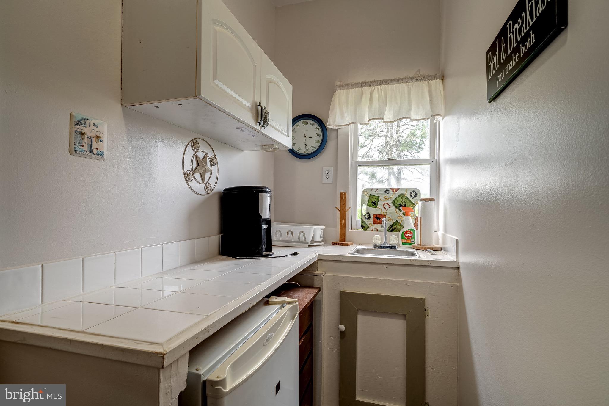 3637 Millwood Road Boyce, VA 22620 - Photo 59 of 62 a kitchen with a cabinets and window