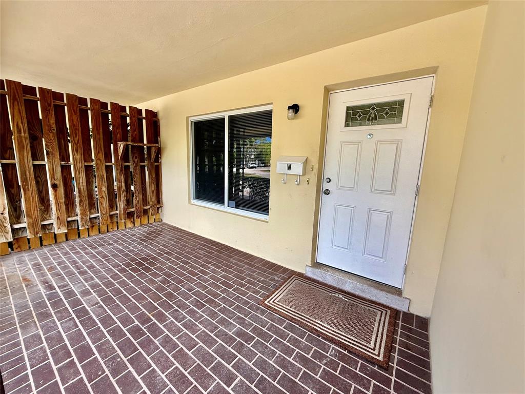 2210 Northeast 54th Street, Unit W Fort Lauderdale, FL 33308 - Photo 20 of 21 a view of front door