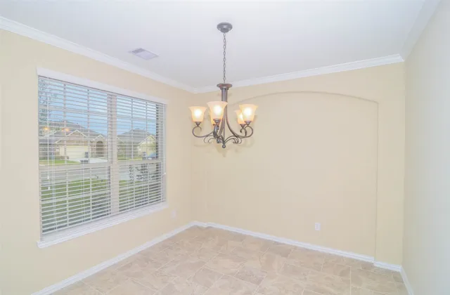 a view of a room with windows