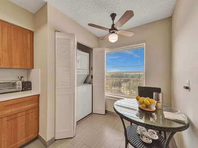 a workspace with furniture and window