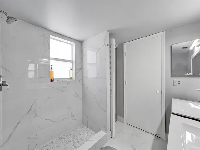 a view of a bathroom with a sink