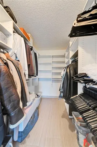 a dining room with furniture window and wooden floor