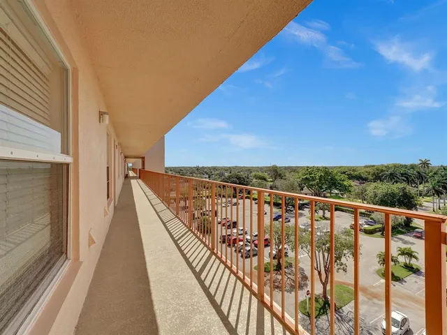 a view of a street with a houses