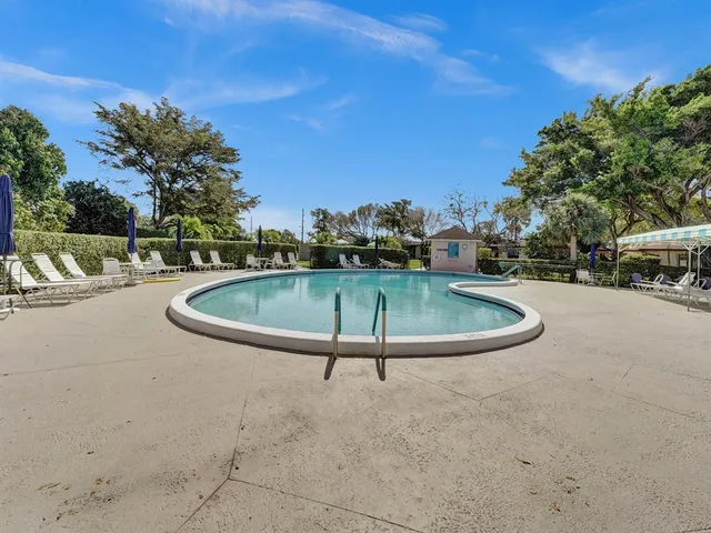 a view of a building with a yard