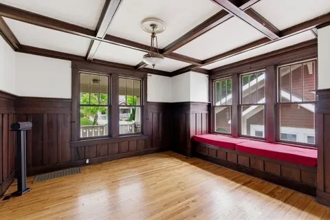 a view of front door with outdoor seating