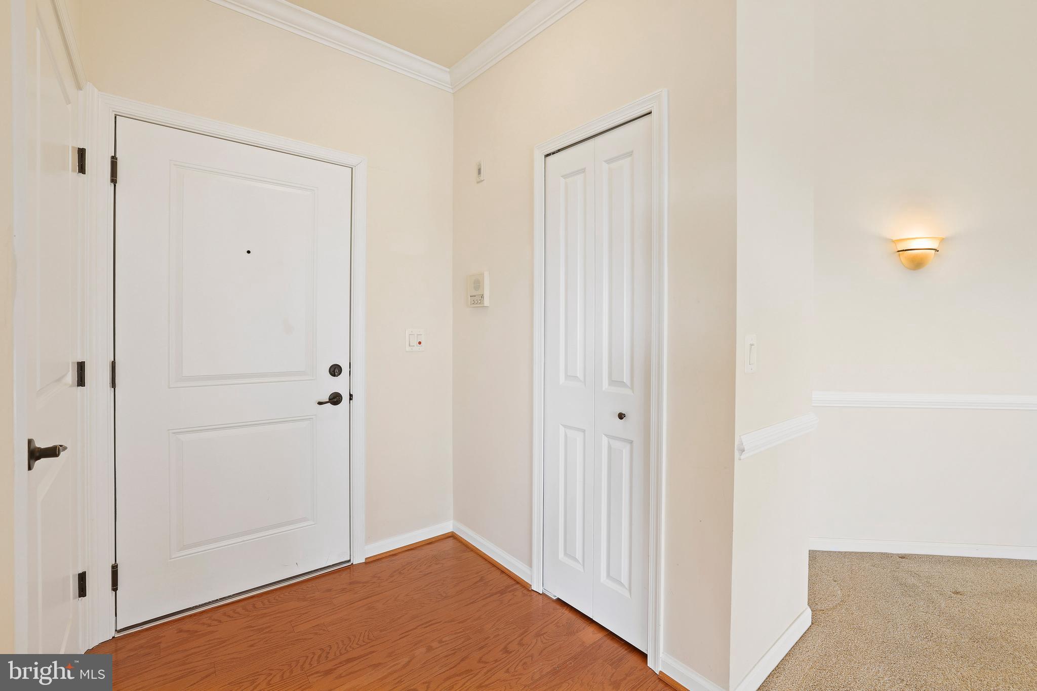 8380 Ice Crystal Drive, Unit R Laurel, MD 20723 - Photo 4 of 47 Gleaming hardwood floors in the foyer.