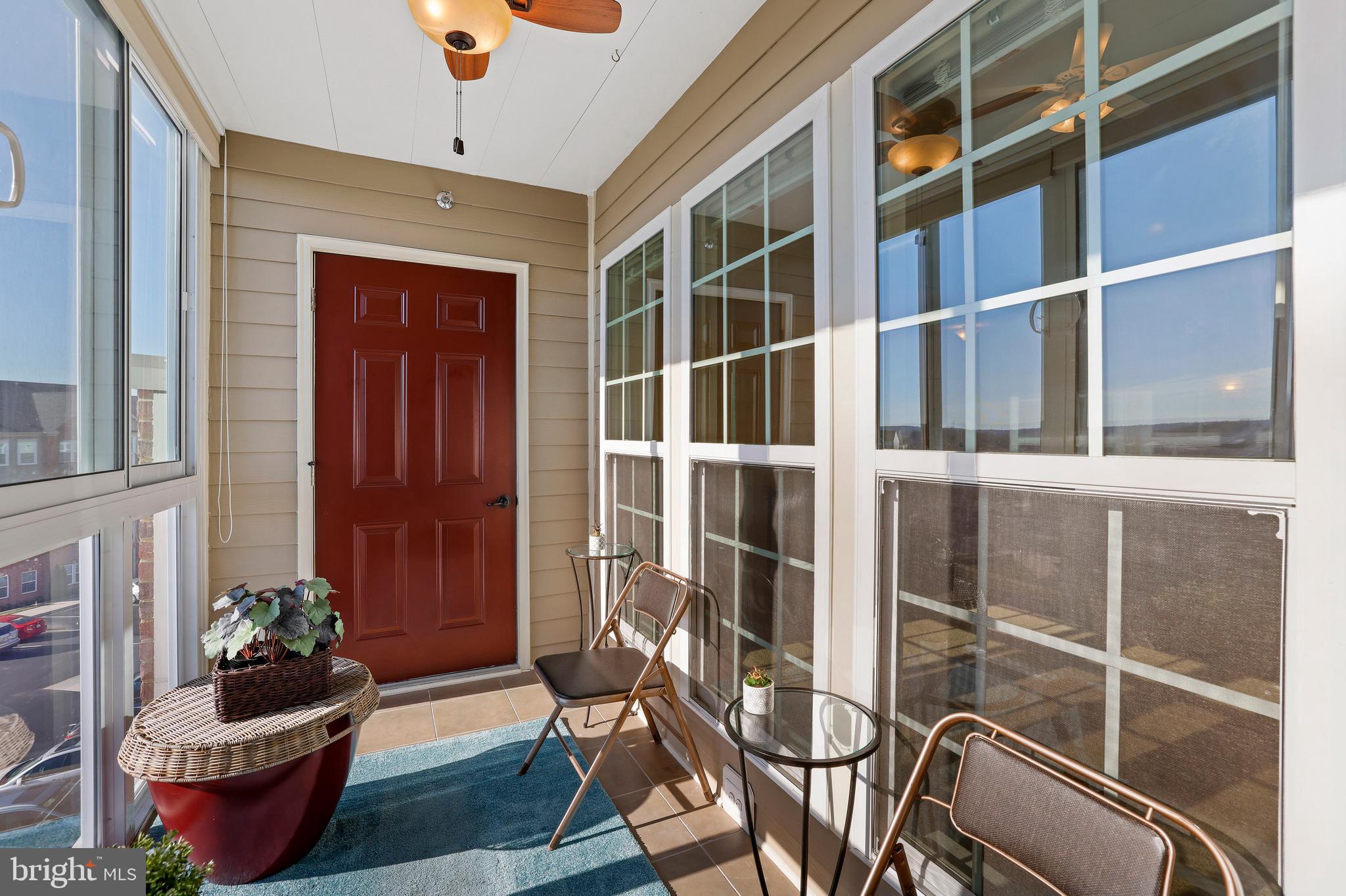 8380 Ice Crystal Drive, Unit R Laurel, MD 20723 - Photo 31 of 47 Glorious screened in sunporch with ceiling fan.