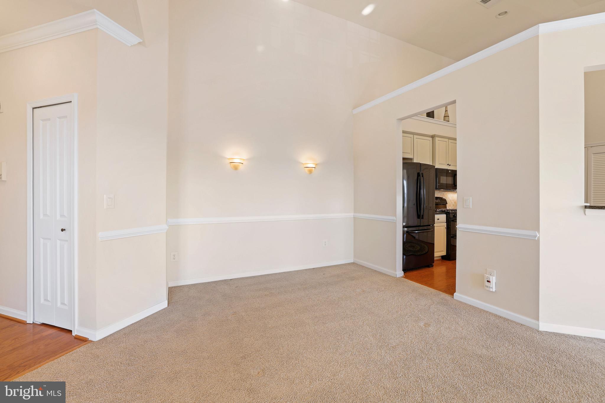 8380 Ice Crystal Drive, Unit R Laurel, MD 20723 - Photo 7 of 47 Chair molding and beautiful wall sconces.