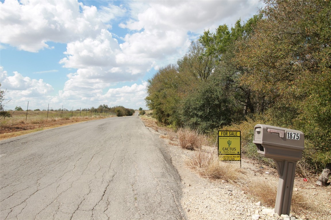 1875 County Road 466 Elgin, TX 78621 - Photo 11 of 11 a view of a street with an ocean view