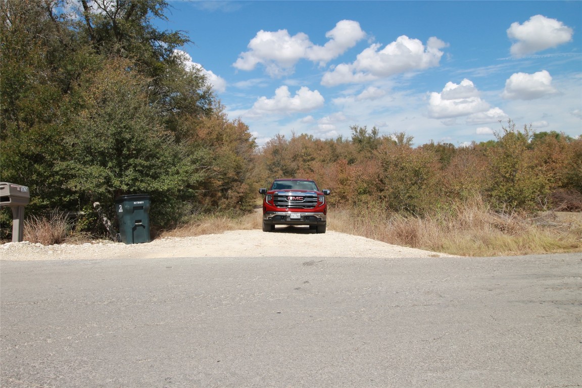 1875 County Road 466 Elgin, TX 78621 - Photo 10 of 11 a car parked on the side of a road