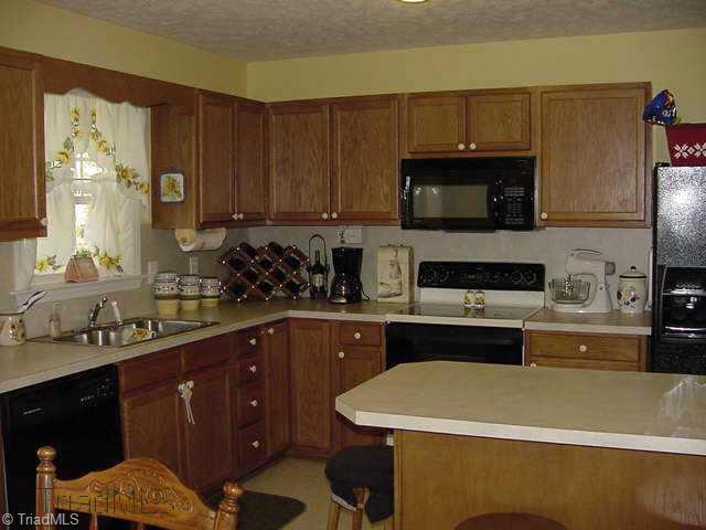 132 South Bridgewater Road Mount Airy, NC 27030 - Photo 4 of 9 Other. Kitchen with appliances remaining!