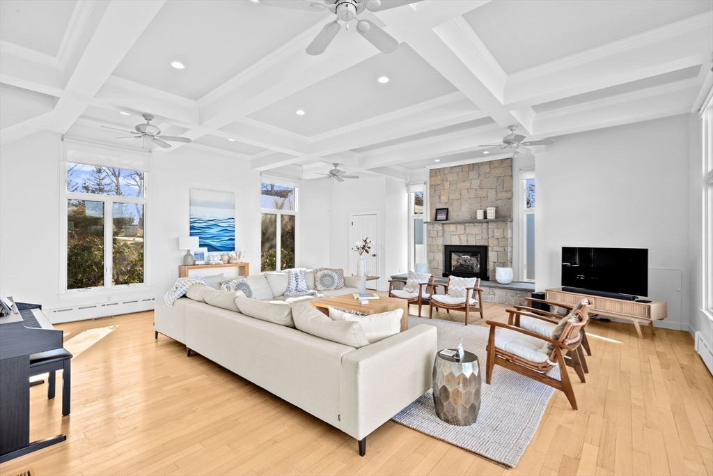 68 Nichols Road Cohasset, MA 02025 - Photo 17 of 41 a living room with fireplace furniture and a flat screen tv