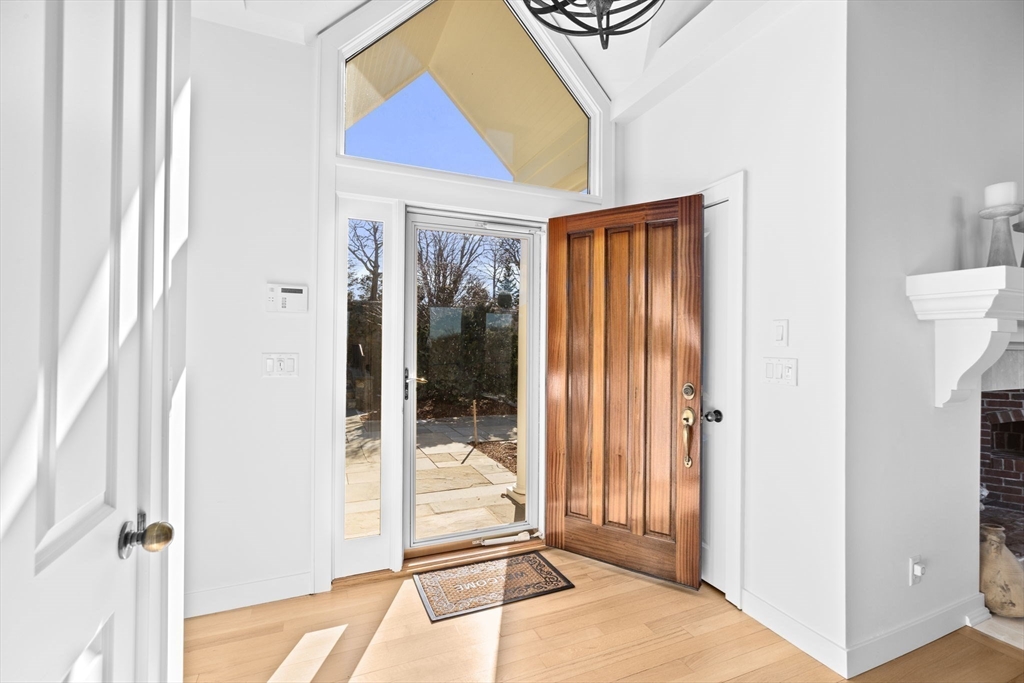 68 Nichols Road Cohasset, MA 02025 - Photo 2 of 41 a view of a hallway with a door and windows