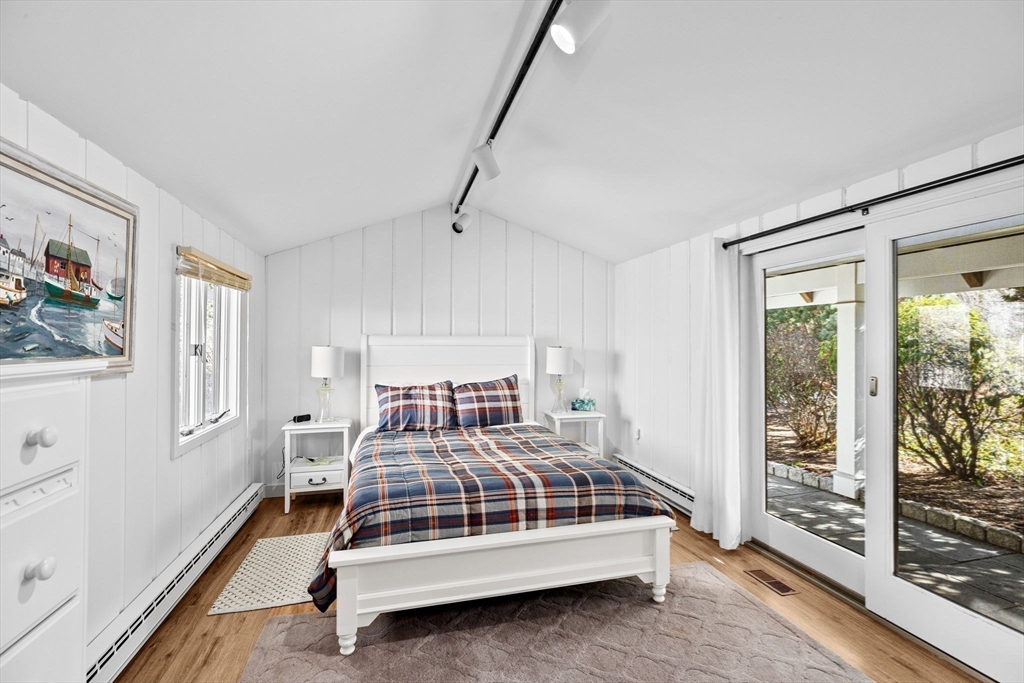 68 Nichols Road Cohasset, MA 02025 - Photo 28 of 41 a bedroom with a bed and a window