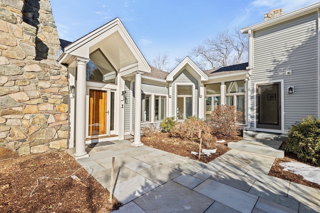68 Nichols Road Cohasset, MA 02025 - Photo 30 of 41 a front view of a house with many windows