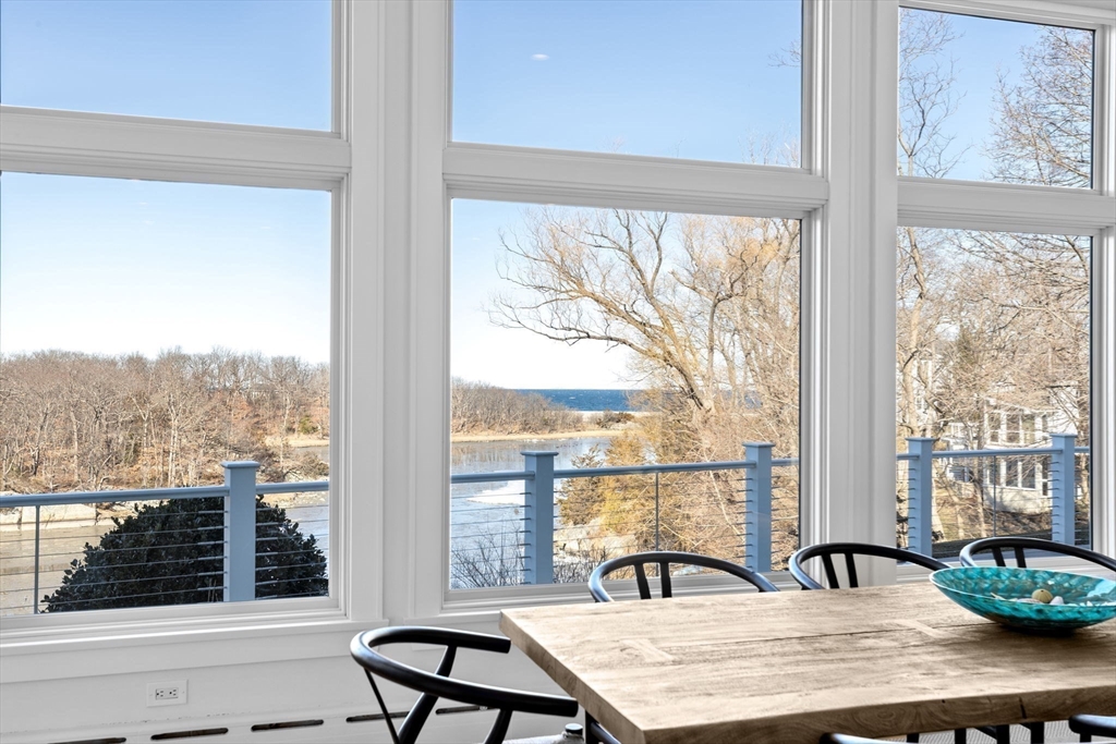 68 Nichols Road Cohasset, MA 02025 - Photo 5 of 41 a view of a city from a balcony