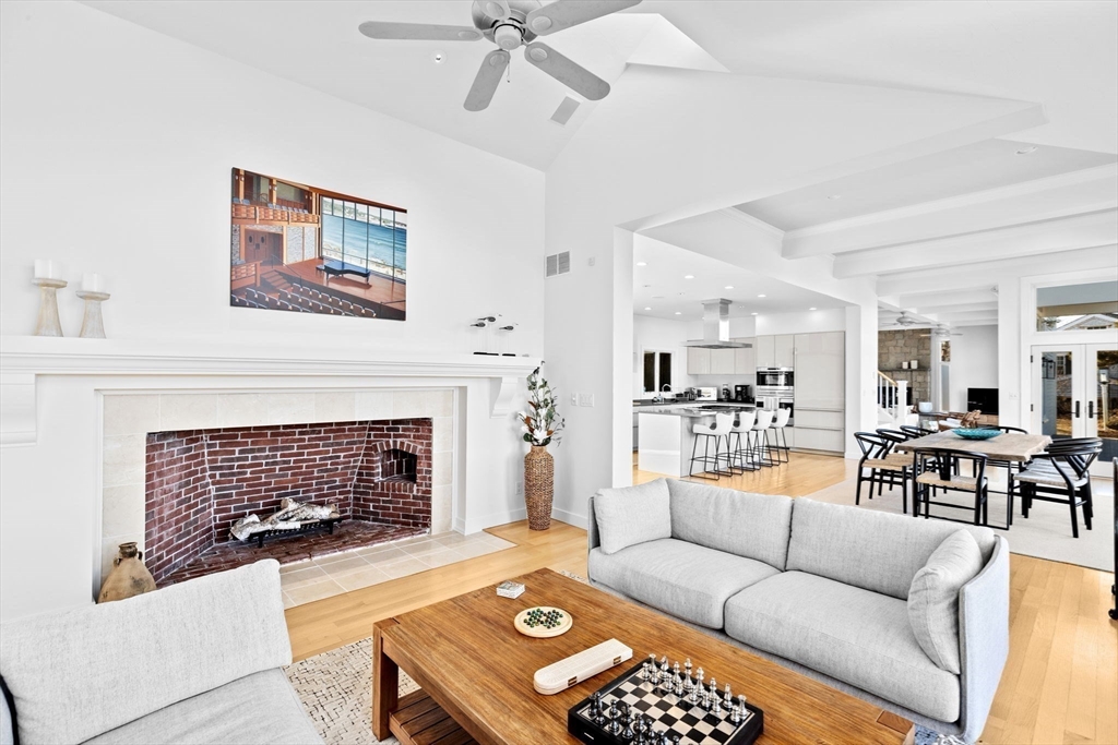 68 Nichols Road Cohasset, MA 02025 - Photo 10 of 41 a living room with furniture and a fireplace