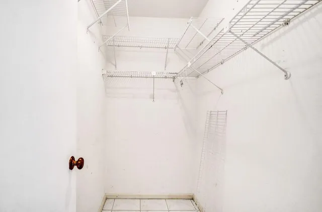 a view of small space with racks on the wall