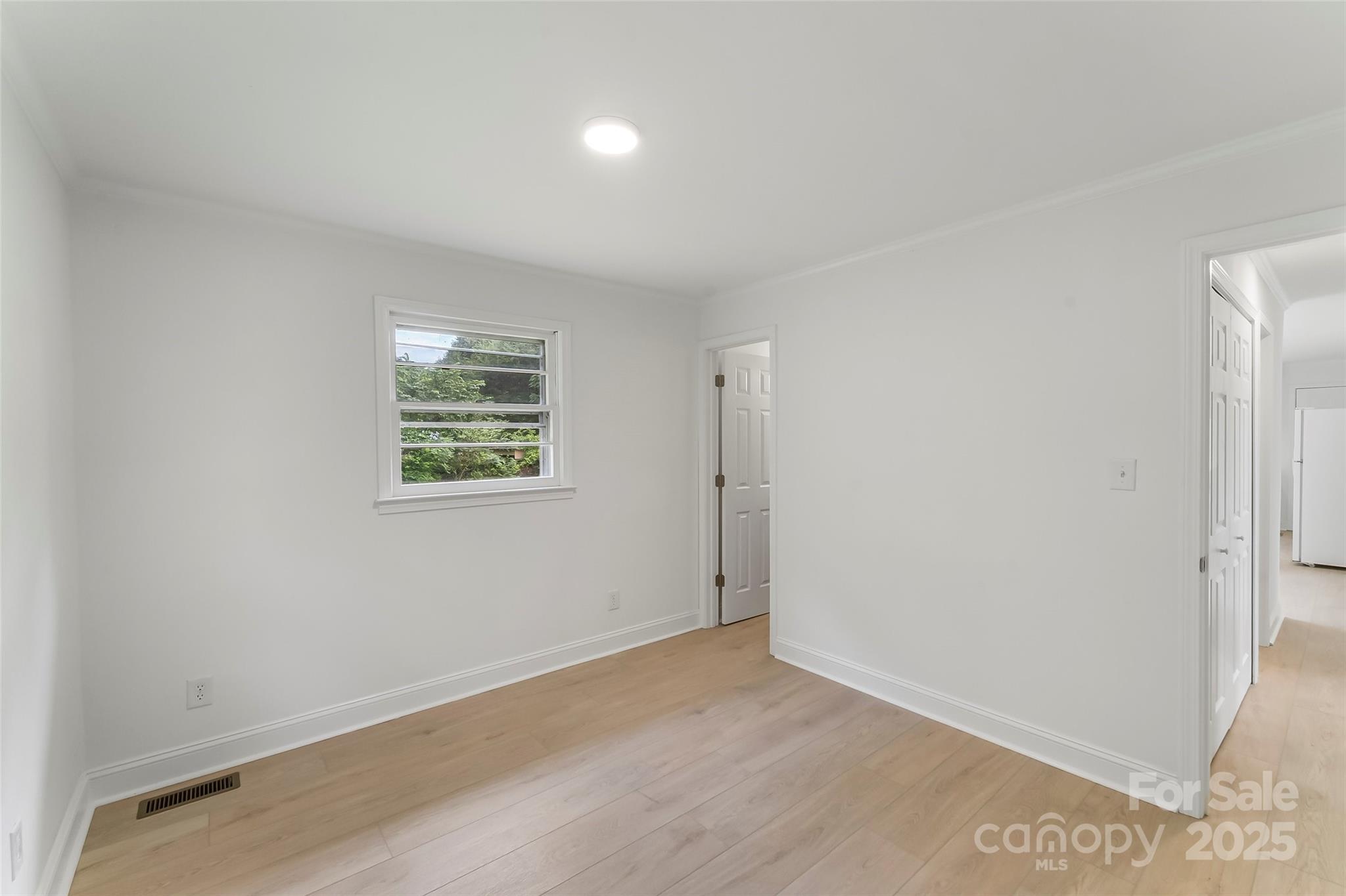 4146 Old State Road Newton, NC 28658 - Photo 12 of 26 an empty room with a window