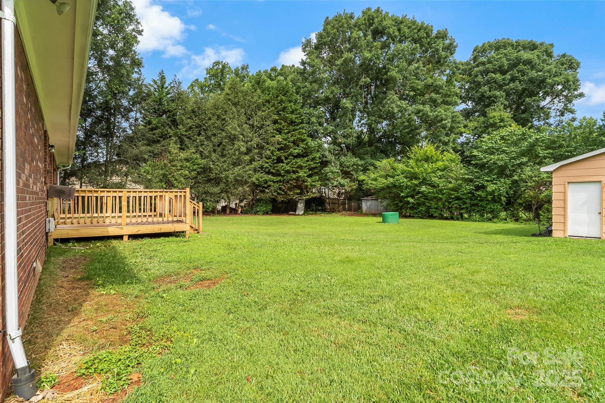 4146 Old State Road Newton, NC 28658 - Photo 18 of 26 a view of green field with house in the background
