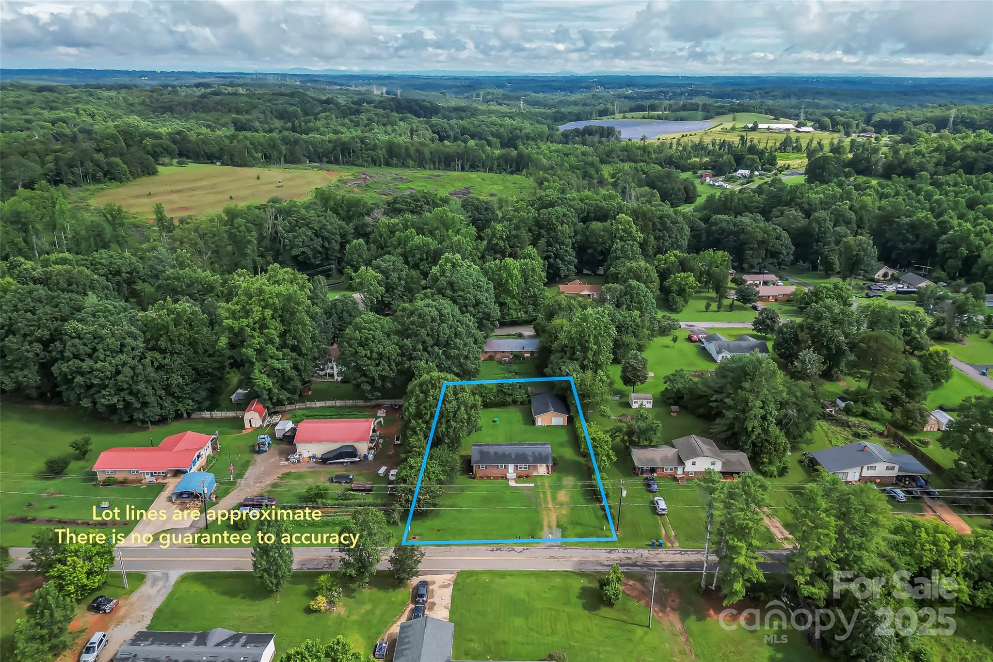 4146 Old State Road Newton, NC 28658 - Photo 22 of 26 a aerial view of a houses with a yard and lake