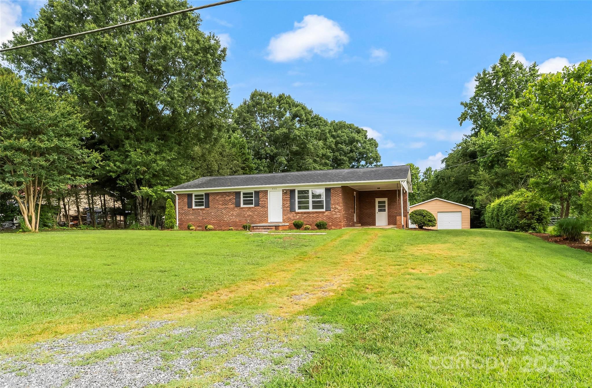 4146 Old State Road Newton, NC 28658 - Photo 26 of 26 a front view of a house with a garden