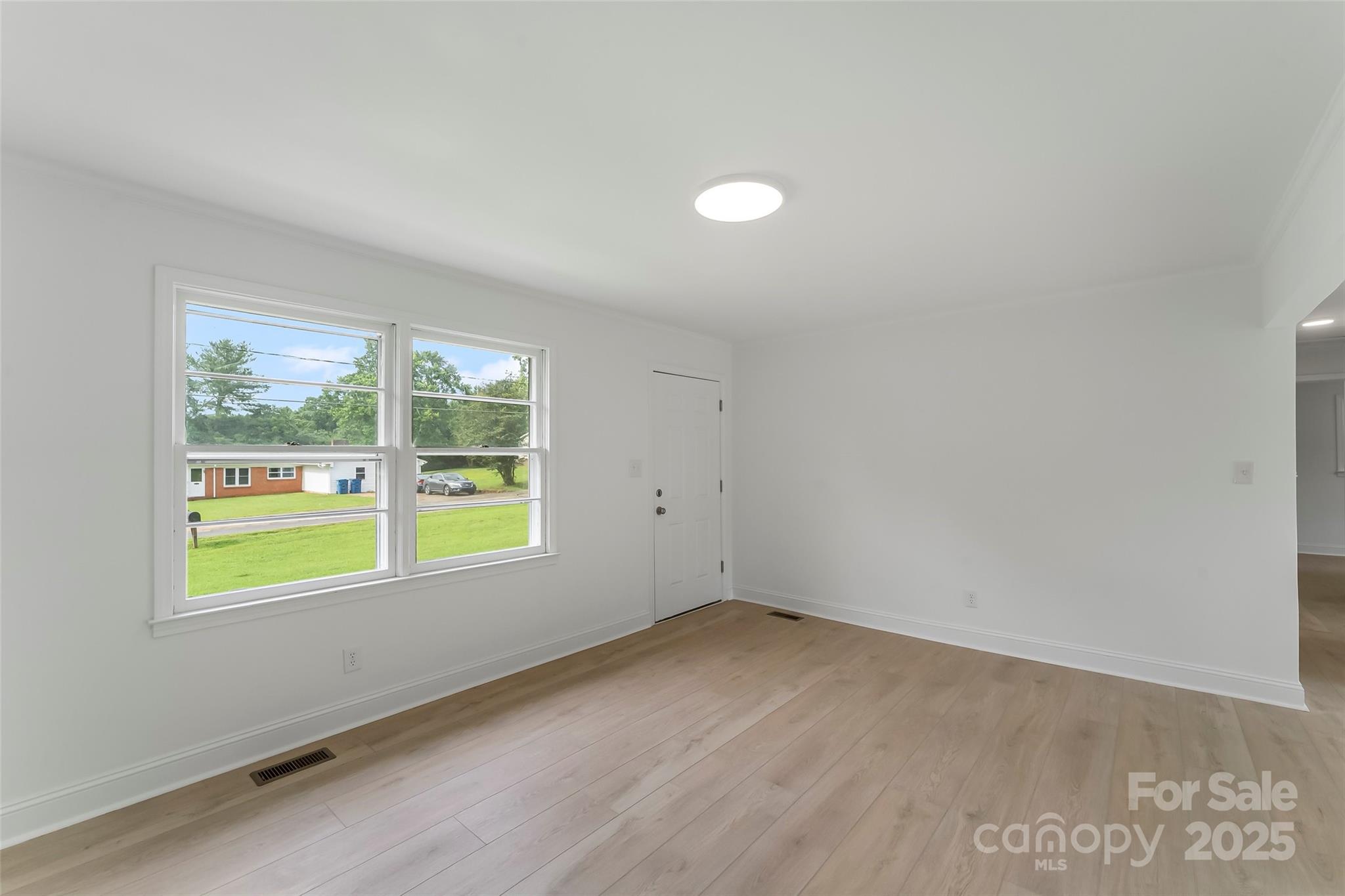 4146 Old State Road Newton, NC 28658 - Photo 5 of 26 an empty room with a window